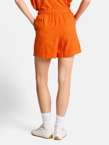 TOM TAILOR DENIM Loose fit Trousers in Orange