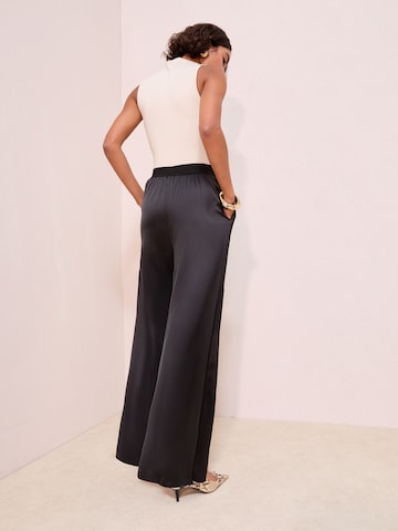 Friends Like These Szeroka nogawka Spodnie w kolorze czarny