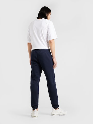 Champion Authentic Athletic Apparel Tapered Broek in Zwart