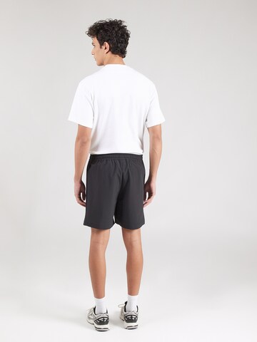 new balance Loosefit Broek in Zwart