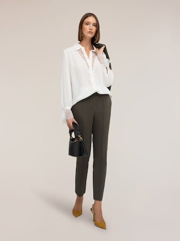 MOTIVI - Blusa en blanco
