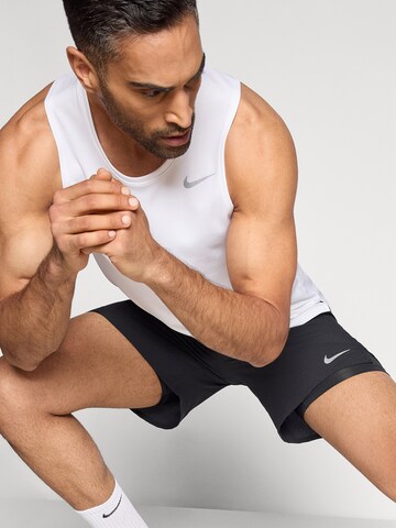 NIKE Loosefit Παντελόνι φόρμας σε μαύρο