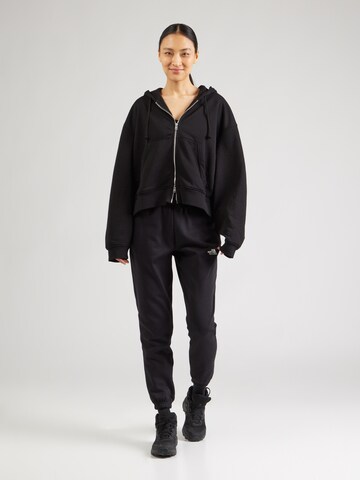 THE NORTH FACE - Tapered Pantalón 'Simple Dome' en negro