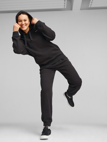 PUMA Tapered Sportbroek 'Her' in Zwart