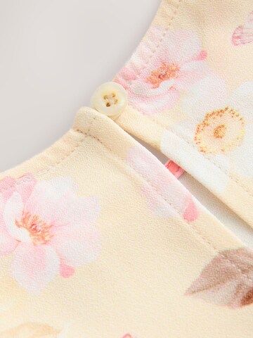 NextJednodijelni komplet - žuta boja