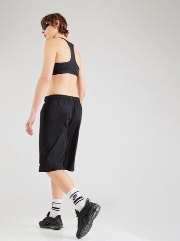 Nike Sportswear Lużny krój Spodnie w kolorze czarny