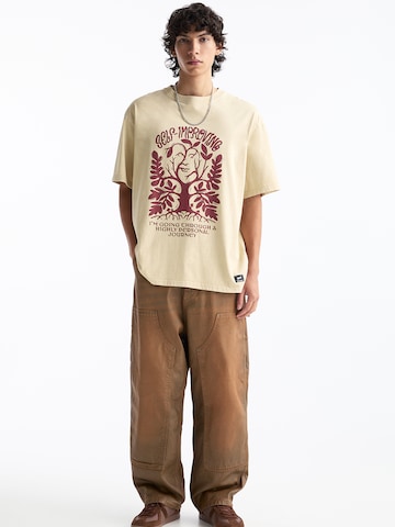 Pull&Bear Koszulka w kolorze beżowy