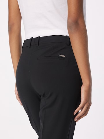 Slimfit Pantaloni cu dungă 'Tilunah' de la BOSS Black pe negru