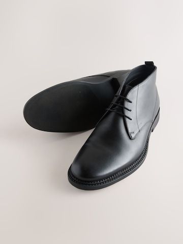 Next - Botines chukka en negro