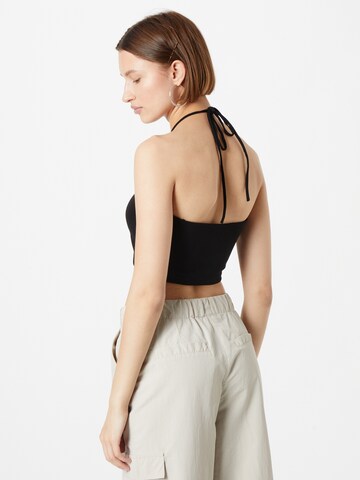 Top 'Aronia' di Gina Tricot in nero