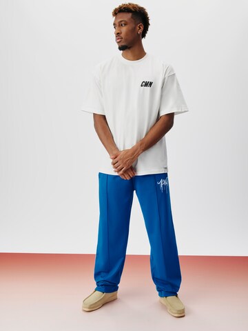 ABOUT YOU x Kingsley Coman Regular Trousers 'Kian' in Blue