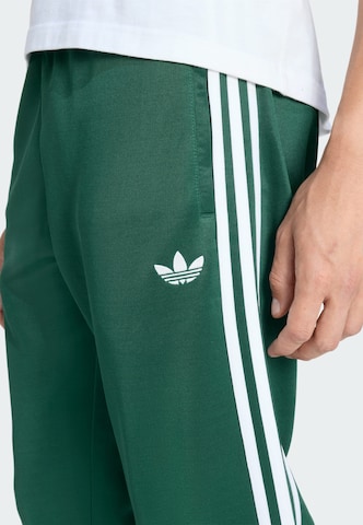 Effilé Pantalon fonctionnel 'Sst' ADIDAS ORIGINALS en vert