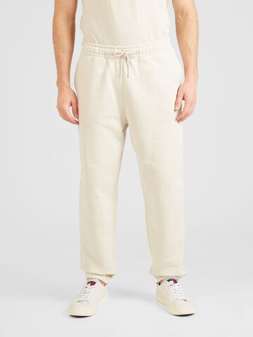 Tommy Jeans Tapered Broek 'CLASSICS' in Beige: voorkant