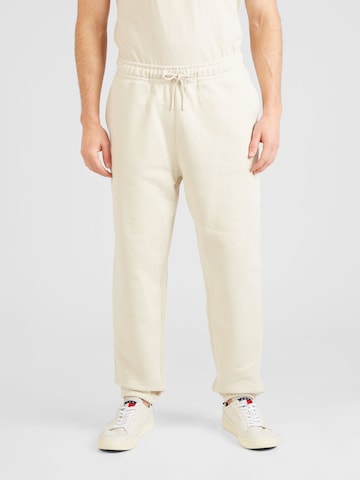 Tommy Jeans Tapered Broek 'CLASSICS' in Beige: voorkant