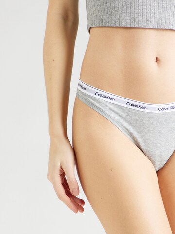 Calvin Klein Underwear Стринг в сиво