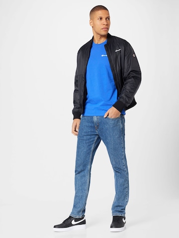 Champion Authentic Athletic Apparel Between-Season Jacket in Blue