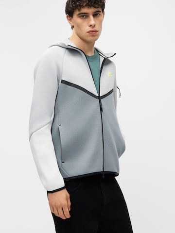 Nike Sportswear Sweatjakke 'TECH FLEECE' i grå