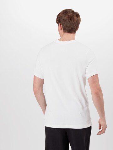 Coupe regular T-Shirt fonctionnel NIKE en blanc