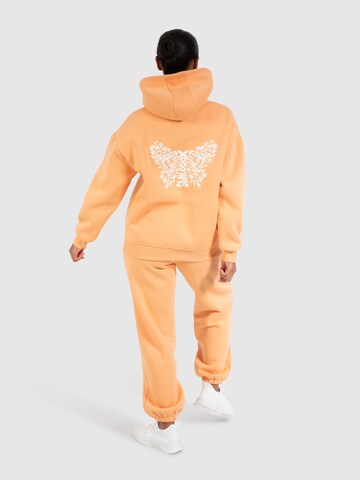 Veste de survêtement ' Nala ' Smilodox en orange