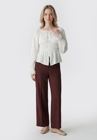 Usha - Blusa en blanco