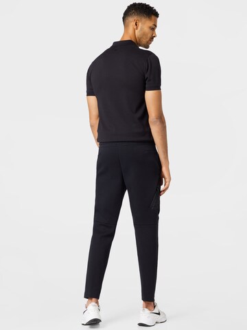 Nike Sportswear Slimfit Kalhoty 'UTILITY' – černá