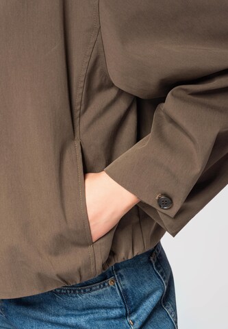 Veste mi-saison Ombre en vert