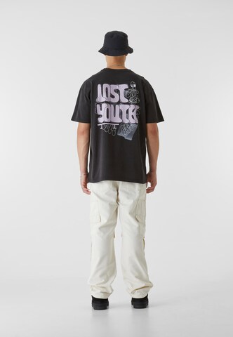 Lost Youth T-shirt 'Skate' i svart