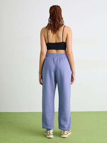 Effilé Pantalon 'Phoenix Fleece' Nike Sportswear en bleu