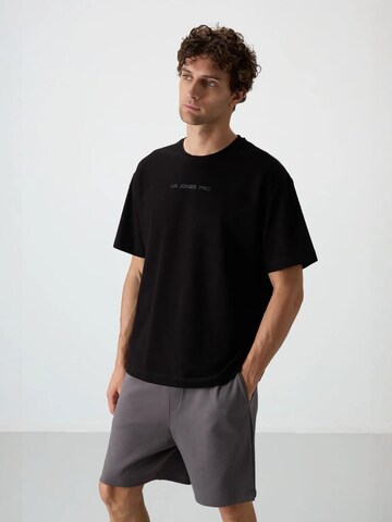 Tommy Life T-Shirts in Schwarz