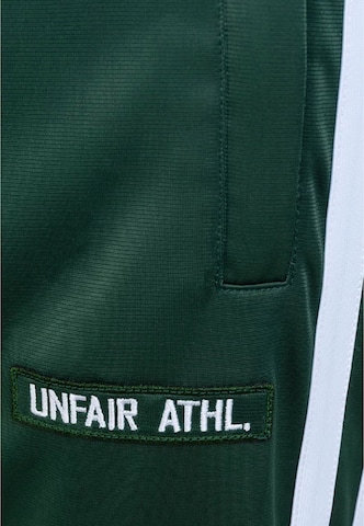 Loosefit Pantaloni sportivi 'DMWU Evolution' di Unfair Athletics in verde