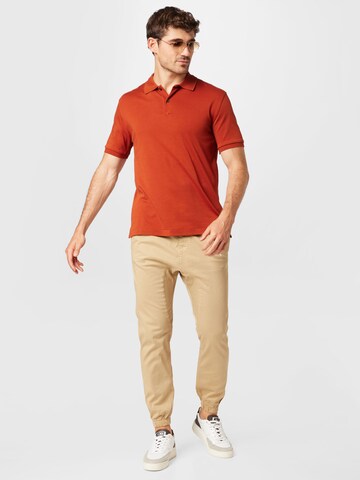 Cotton On Zwężany krój Spodnie 'Drake' w kolorze beżowy