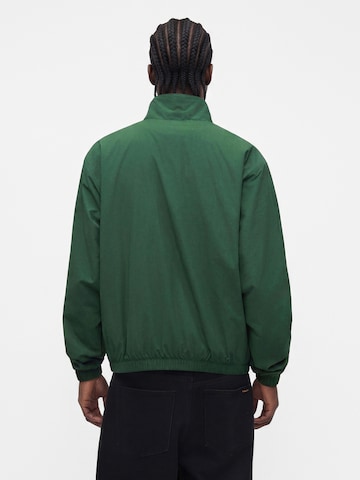 Nike Sportswear Prehodna jakna 'Club' | zelena barva