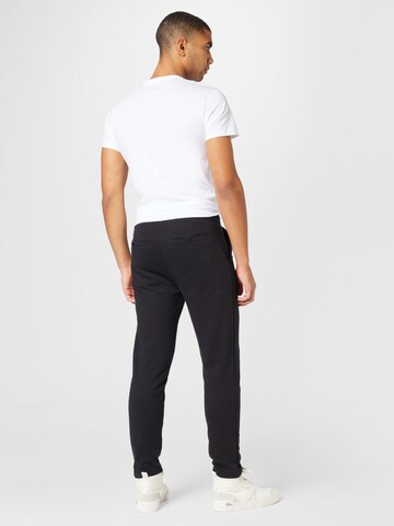 WESTMARK LONDON Regular Trousers in Black