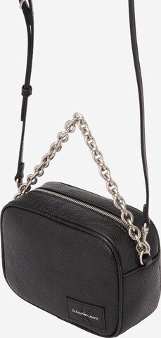 Sac à bandoulière Calvin Klein Jeans en noir