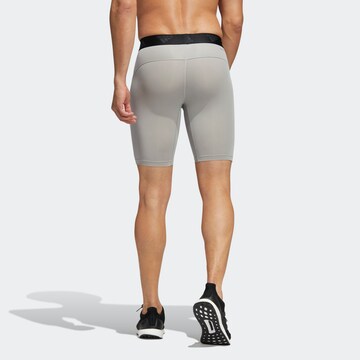 ADIDAS SPORTSWEAR - Skinny Calças de desporto em cinzento