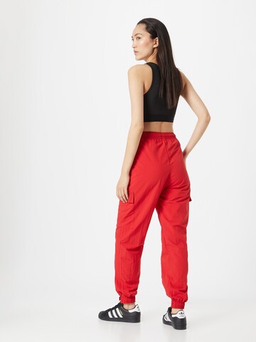 ADIDAS SPORTSWEAR Zwężany krój Spodnie sportowe 'Dance Versatile ' w kolorze czerwony