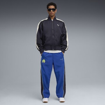 PUMA Loosefit Sportbroek 'Olympique De Marseille FtblEssentials Cellerator' in Blauw