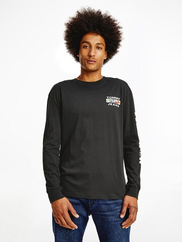 Tommy Jeans - Camiseta 'Mono Positivity' en negro: frente