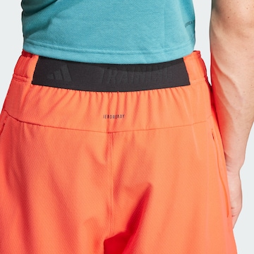 ADIDAS PERFORMANCE Regular Workout Pants in Orange