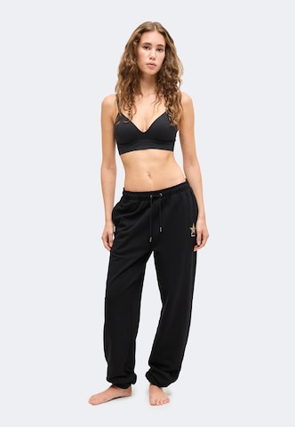 Tapered Pantaloni di GUESS JEANS in nero