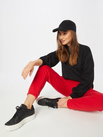 Effilé Pantalon 'ONCE' DRYKORN en rouge