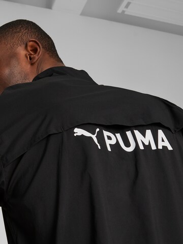 PUMA Sportjacke in Schwarz