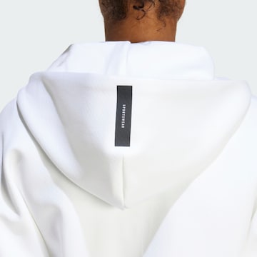 ADIDAS SPORTSWEAR Спортна жилетка с качулка 'Z.N.E.' в бяло
