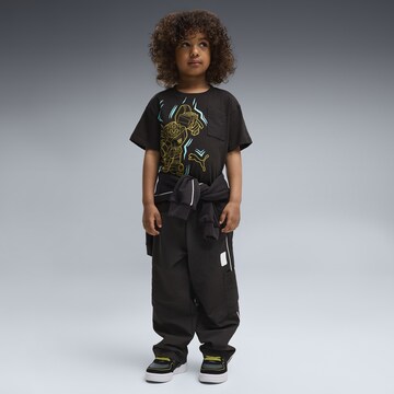 PUMA Loosefit Sporthose 'Puma x Transformers' in Schwarz