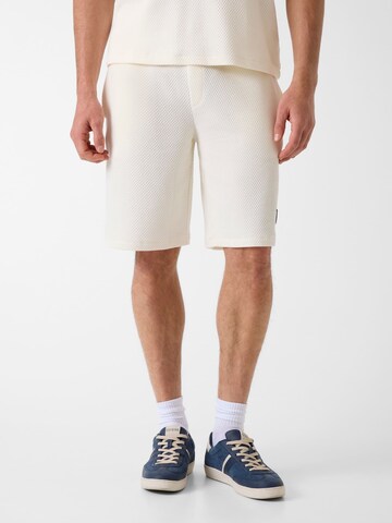 GUESS Loose fit Pants in Beige: front