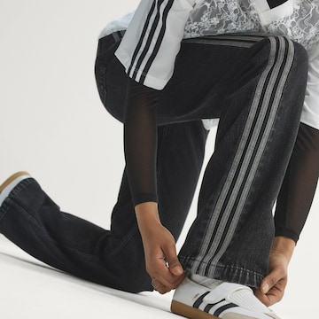 juoda ADIDAS ORIGINALS Standartinis Džinsai 'Firebird'