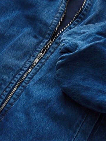 Next Tussenjas in Blauw