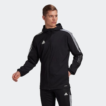 ADIDAS SPORTSWEAR Skinny Training Jacket 'Tiro 21' in Black: front