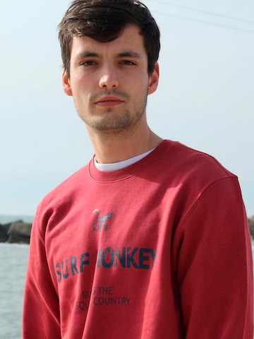 Surf Monkey - Sudadera en rojo: frente