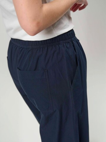 Regular Pantalon ' UWMire ' U.S. POLO ASSN. en bleu : sur le côté